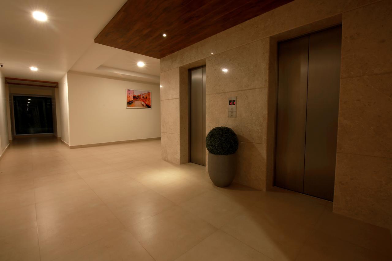 Palguni Residency Hotel ฮาสซัน ภายนอก รูปภาพ